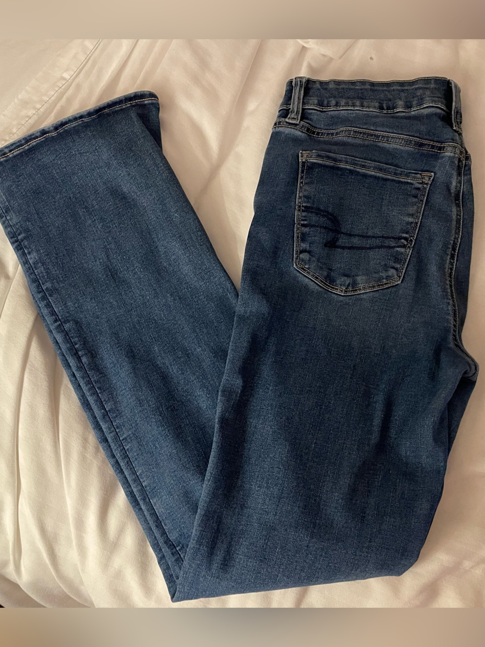American Eagle Ne(x)t Level Stretch medium-wash denim jeans featuring ultra-flex